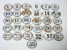 BLACK & WHITE ENAMEL OVAL NUMBER PLAQUES (31)