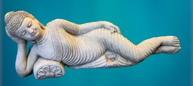 GARDEN STONEWARE - reconstituted statuary of a reclining Buddha type figurine, 28cms H, 80cms L