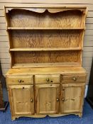 REPRODUCTION PINE KITCHEN DRESSER - having a three shelf rack over a base section of three frieze
