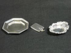 A THREE PIECE SILVER PARCEL - 1. A match holder with gold detail to the clasp, Birmingham 1935. 1.