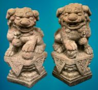GARDEN STONEWARE - reconstituted statuary depicting Chinese Temple Lions, a pair, holding a ball