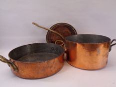 ANTIQUE COPPER & BRASS COOKING PANS, LARGE & HEAVY - a shallow circular pan with twin brass carry