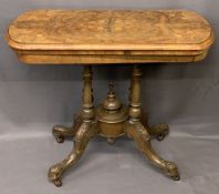 VICTORIAN WALNUT FOLDOVER CARD TABLE - on turned and carved supports and central urn finial on brown