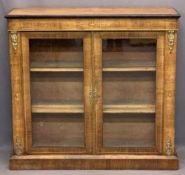 CIRCA 1850 INLAID WALNUT TWO DOOR SIDE CABINET - with brass embellishments on a plinth base, 99cms
