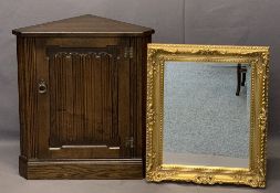 LINENFOLD CARVED FLOOR STANDING CORNER CUPBOARD and a modern gilt framed wall mirror with bevelled