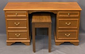 STAG 6 DRAWER DESK DRESSING CHEST, 69cms H, 130cms W, 43cms D and a piano stool, 56cms H, 66cms W,