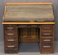 VINTAGE OAK ROLL TOP DESK - the tambour front opening to reveal interior drawers and pigeonholes