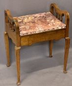 WALNUT BOX SEAT PIANO STOOL - having shaped sides on spindle gallery and tapering supports, 62cms H,