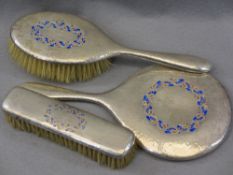 LIBERTY & CO SILVER & ENAMEL THREE PIECE DRESSING TABLE SET - hand mirror and two brushes,