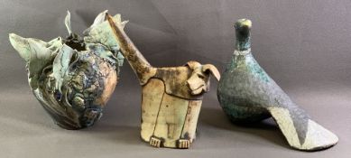 THREE UNUSUAL ART POTTERY PIECES - a humorous looking standing dog, a large dove and a circular bowl
