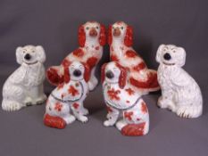 STAFFORDSHIRE COMFORTER DOGS, three pairs - smaller red and white pair with separate front legs,