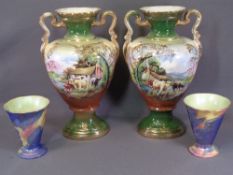 STAFFORDSHIRE VASES, a pair of twin handled, 43cms H, decorated Highland Cattle and a pair of Maling