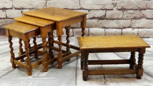 OAK OCCASIONAL TABLES comprising nest of three with barley twist legs and a low table or stool