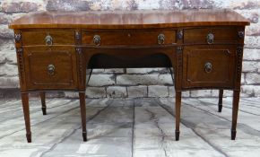 GEORGE III-STYLE SERPENTINE MAHOGANY SIDEBOARD, shaped top above two frieze drawers, cellarette