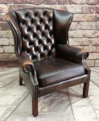 A MODERN REPRODUCTION GEORGIAN-STYLE WING-BACK LEATHER ARMCHAIR, brown button upholstered and