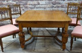 ELIZABETHAN-STYLE GOLDEN OAK DRAW-LEAF DINING TABLE & FOUR SIMILAR CHAIRS, moulded edge and carved