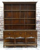 MODERN REPRODUCTION OAK WELSH DRESSER, boarded delft rack with wrought iron hooks, on base fitted