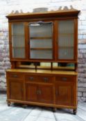 EDWARDIAN OAK KITCHEN DRESSER, foliate carved pediment above shaped cornice and paper-lined and