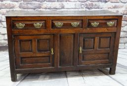 18TH CENTURY JOINED OAK WELSH DRESSER BASE, North Wales, boarded top above three frieze drawers