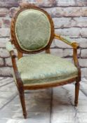LOUIS XIV-STYLE CARVED BEECHWOOD FAUTEUIL, upholstered seat back and arms, fluted legs Condition: