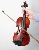 CHILD'S QUARTER SIZE VIOLIN, LOB 10 1/2 ins (26.8cms) with label 'Celebre Vosgien' with bow 53cms,