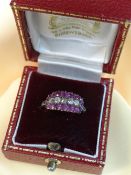 DIAMOND & RUBY TRIPLE ROW RING comprising five diamonds and sixteen rubies, ring size K, 1.8gms,