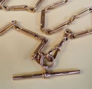 9CT GOLD TROMBONE LINK WATCH CHAIN, with T-bar, 37.5cms long, 23.8gms