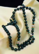 LONG STRING OF MALACHITE & PEARL BEADS, 90cms long, with jewellery pouch Condition: a few chips to