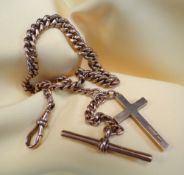 9CT GOLD ALBERT WATCH CHAIN, having graduated curb links, T-bar and 9ct gold cross pendant, 36cms