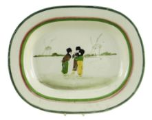 A LLANELLY POTTERY DUTCH BOYS PLATTER the children in a landscape with two windmills beyond,