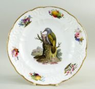 A FINE SWANSEA LONDON DECORATED PORCELAIN PLATE of small size and having a moulded border with c-