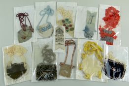 COLLECTION OF EARLY 20TH CENTURY EISTEDDFOD RELATED ITEMS comprising nine purses of varying design