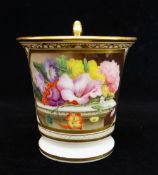 A SWANSEA PORCELAIN CABINET CUP footed with flared rim and gryphon handle picked out in gold, finely