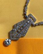 ART DECO DIAMOND ENCRUSTED PENDANT ON CHAIN, having diamond drop (1.0ct approx.) below the pierced