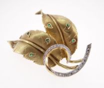 14CT GOLD EMERALD & DIAMOND LEAF BROOCH, 5.5cms wide, 18.6gms, in Jeffries of Newport jewellery