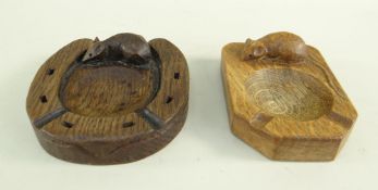 TWO ROBERT 'MOUSEMAN' THOMPSON OAK ASHTRAYS, one carved as a horseshoe, the other of canted