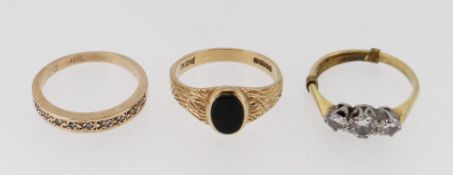 THREE GOLD RINGS comprising 18ct gold three stone diamond ring, gold diamond chip half eternity ring