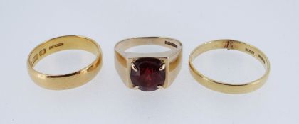 THREE GOLD RINGS, incl 18ct garnet ring, 18ct wedding band (cut), and 22ct wedding band (3)