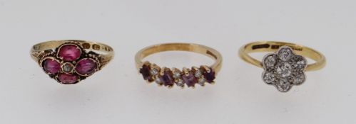 THREE GOLD RINGS comprising 18ct gold & platinum diamond cluster ring, 12ct gold ruby ring and a 9ct