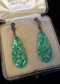PAIR OF CHINESE JADEITE DROP EARRINGS, pierced and carved floral oval flat drops to fleur-de-lis