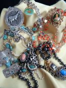 ASSORTED SILVER & COSTUME JEWELLERY, including Mexican Aztec-style pendant, Chinese jadeite dog of