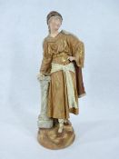 RUDOLSTADT PORCELAIN FIGURINE - of a cloaked maiden against a Corinthian capped column, printed