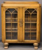 GOOD HONEY OAK ART DECO BOOKCASE - railback with central reeded and carved panel and flanking glazed