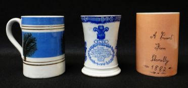 THREE LLANELLY MUGS including a mocha ware pint measure, decorated with sponged trees to coloured