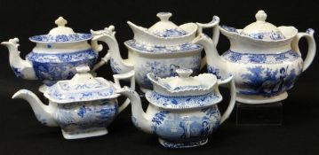 FIVE ANTIQUE WELSH POTTERY TEAPOTS, each in various blue and white transfer patterns including '