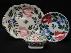 THREE LLANELLY POTTERY ITEMS IN THE PERSIAN ROSE PATTERN comprising large tureen stand, 41cms,