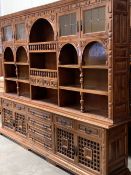 LARGE CONTINENTAL STYLE DISPLAY/STORAGE UNIT having leaded glazed upper doors, central arched