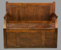 VINTAGE OAK DOUBLE BOX SEAT BENCH, joined oak construction with panelled back and open arms,