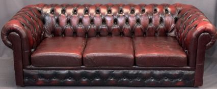 RED LEATHER UPHOLSTERED CHESTERFIELD SETTEE - 3 seater, 71cms H, 210cms W, 54cms seat D