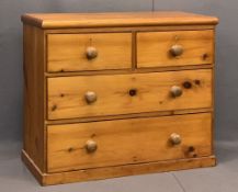 VICTORIAN PINE CHEST OF TWO SHORT OVER TWO LONG DRAWERS - with turned wooden knobs on a plinth base,